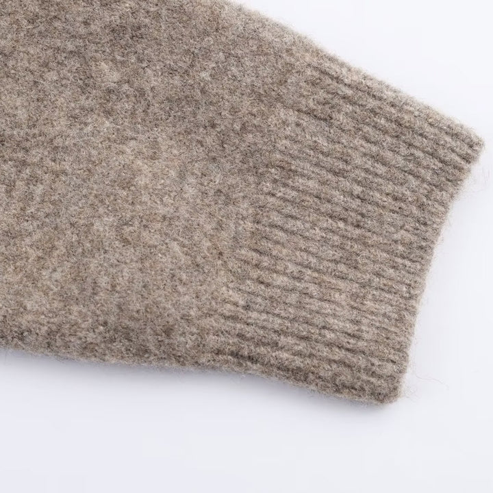 Short knitted jacket for women with button closure Lune London