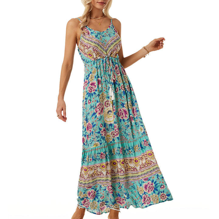 Airy maxi dress for women with a playful floral design and a drawstring at the waist Lune London