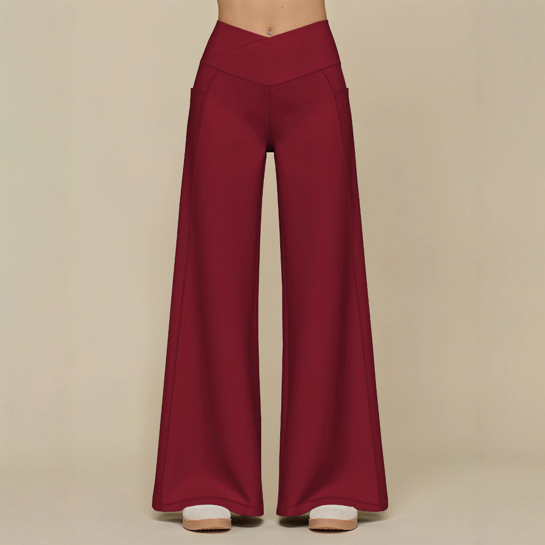 Elegant high-waisted casual trousers for women, with wide legs and practical pockets Lune London