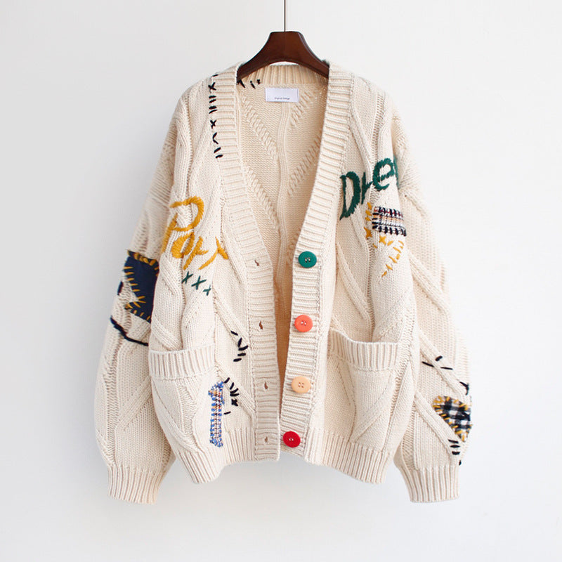 Women's knitted jacket with colorful buttons and unique embroidery patterns Lune London