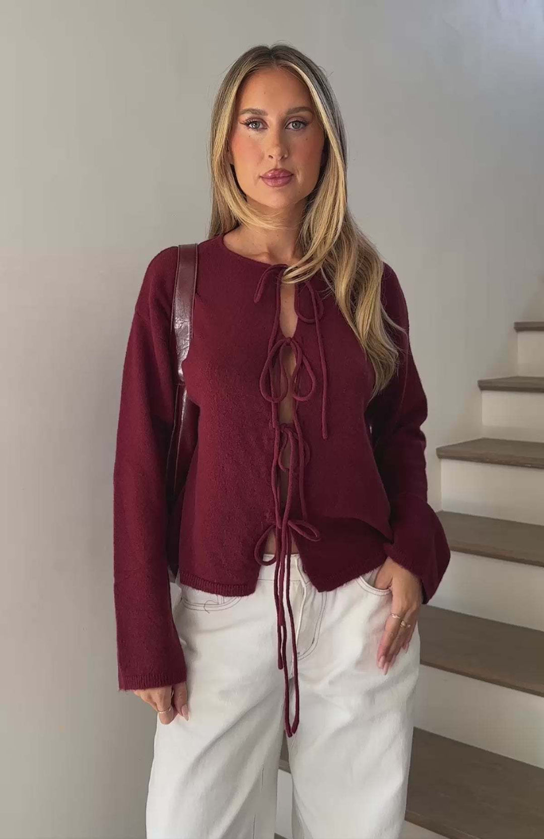 Cardigan féminin tendance avec un design de lacet innovant et des manches surdimensionnées Chic & Stil