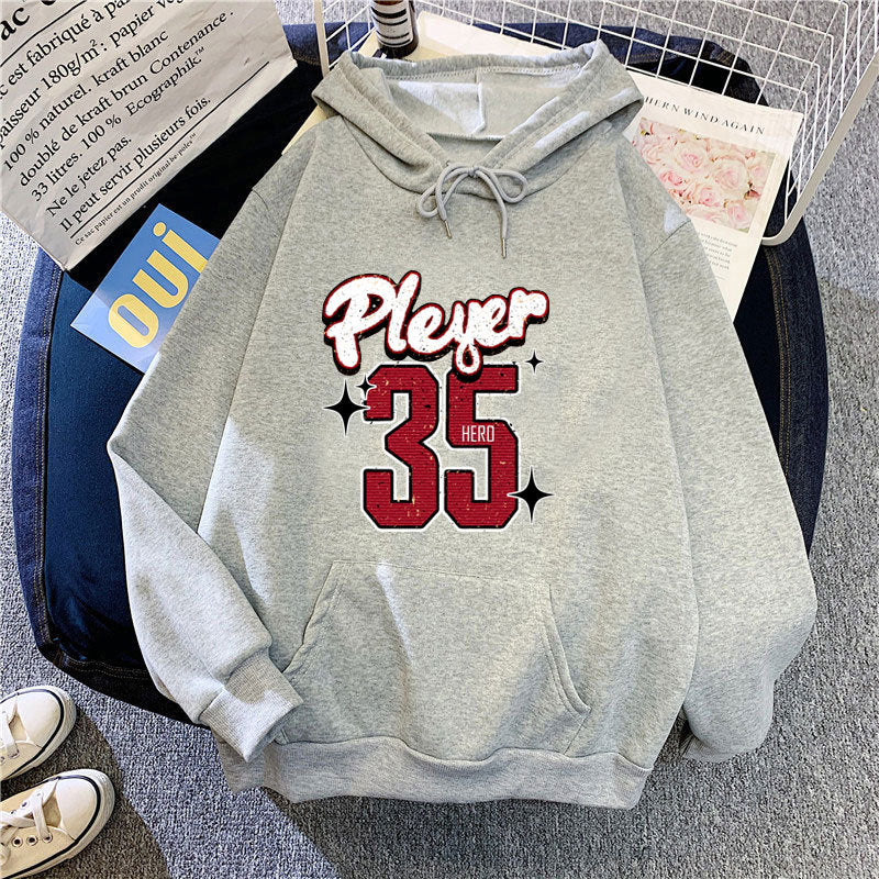 Women's hooded sweatshirt with creative basketball design Chic & Stil
