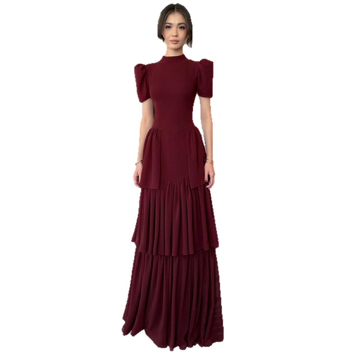 Women's maxi dress with voluminous ruffle details and elegant cut