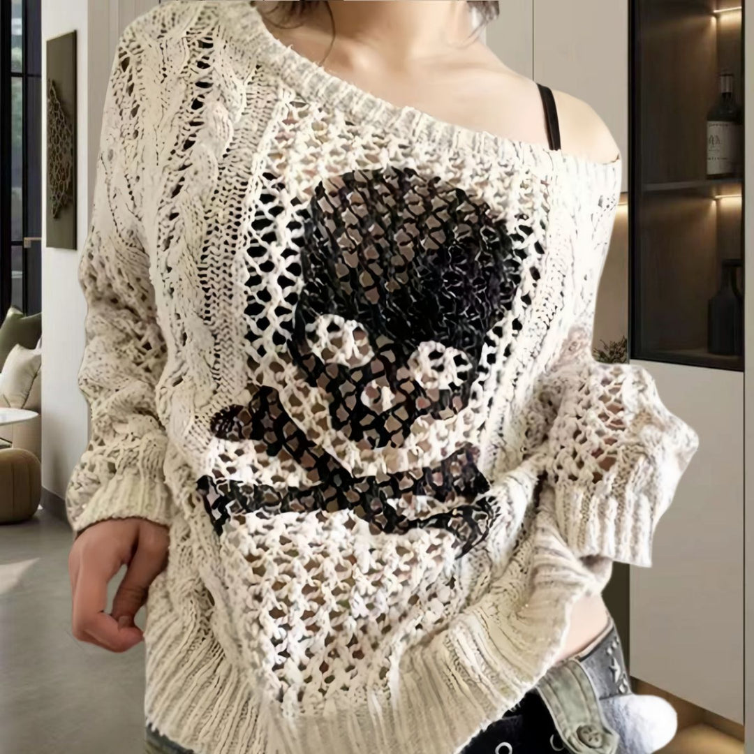 Oversized knit sweater for women with a creative hole pattern and a chic anchor design