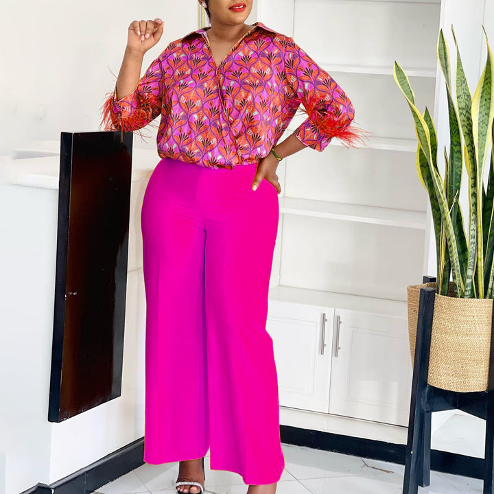 Expressive outfit for women with printed blouse and wide pants Lune London