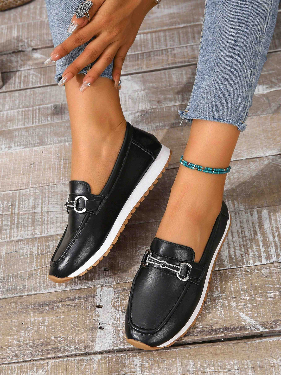 Elegant loafers for ladies with fashionable buckle detail Lune London