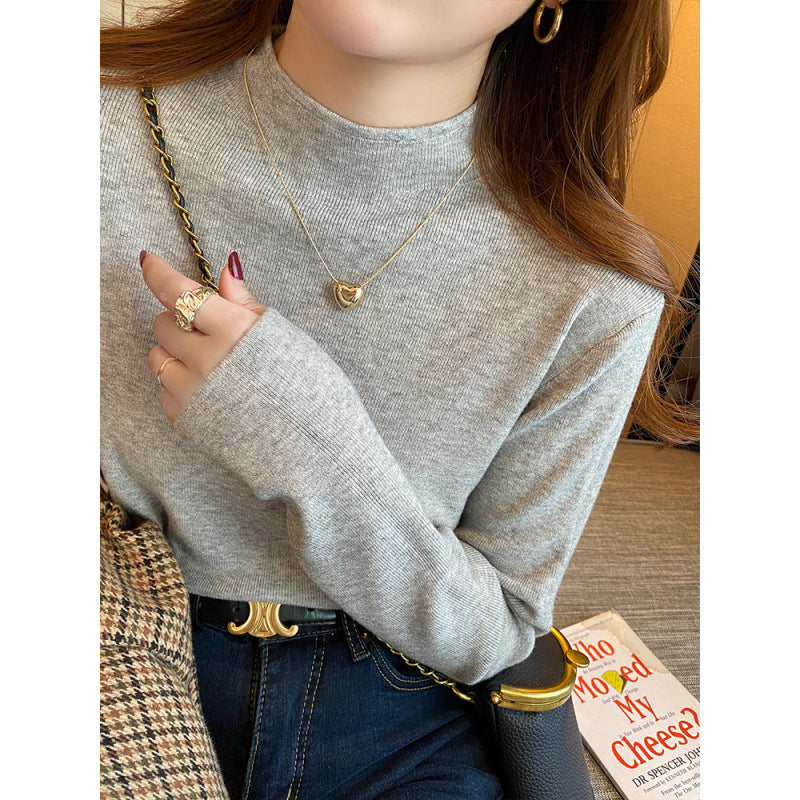 Pull-over tricoté pour femmes avec col montant et matériau doux Chic & Stil