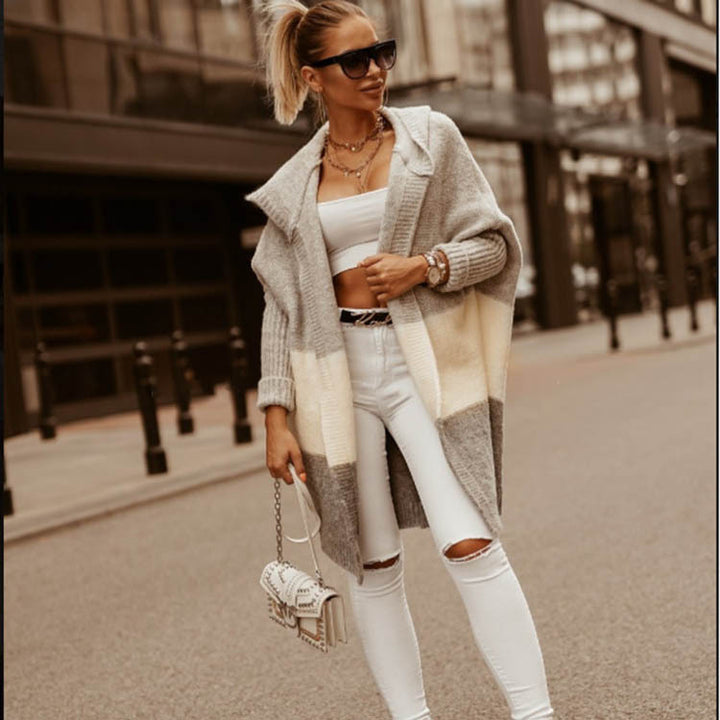 Women knitted poncho with hood and modern color block design Lune London