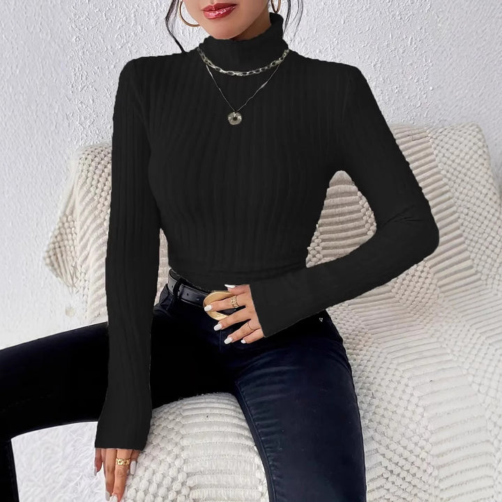 Ladies elegant ribbed knit top with high collar and longer cut Lune London