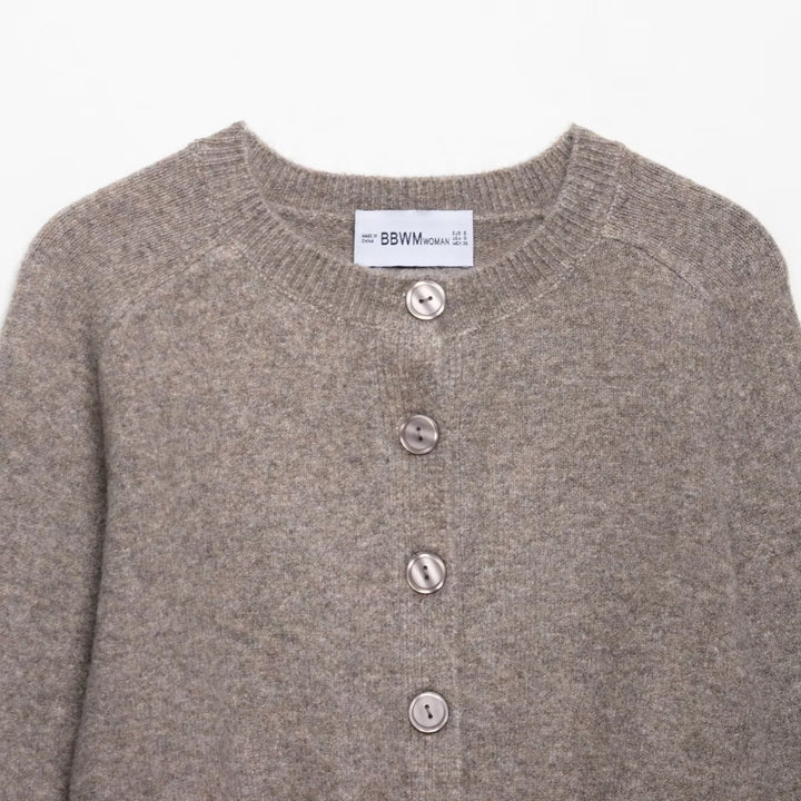 Short knitted jacket for women with an elegant round neck and button closure Lune London