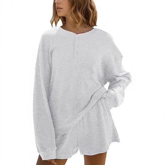 Dames loisirs t-shirt à manches longues pull avec détails de boutons Chic & Stil