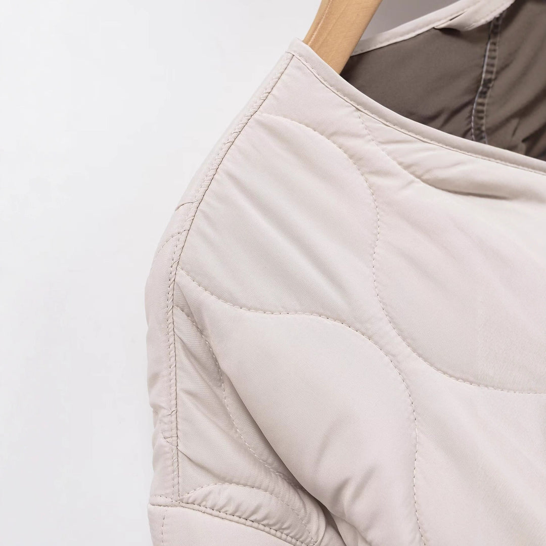 Veste de transition matelassée pour femmes avec poches latérales et coupe moderne Chic & Stil