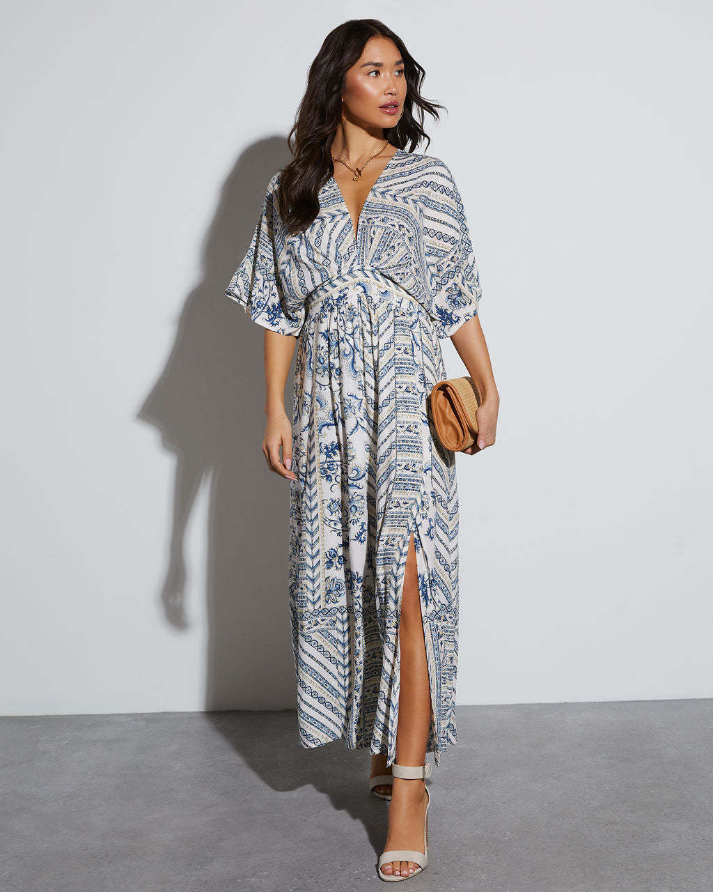 Women's maxi dress with exciting wrap design and voluminous sleeves