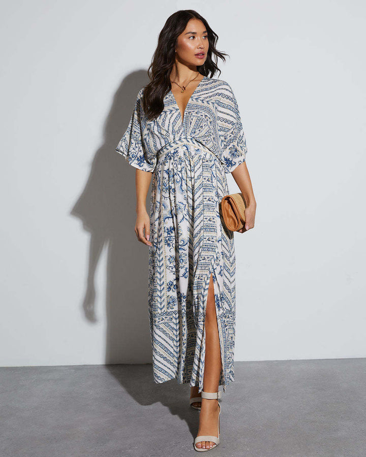 Women's maxi dress with exciting wrap design and voluminous sleeves