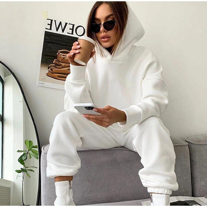 Women's comfortable hooded jumpsuit with a loose fit and elastic waistband Chic & Stil