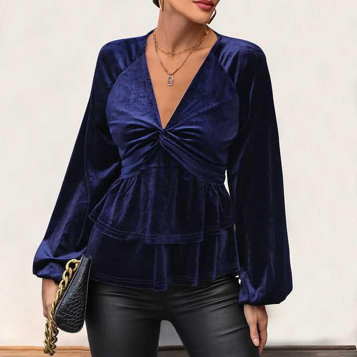 Top féminin avec un peplum volumineux et un décolleté en V profond Chic & Stil