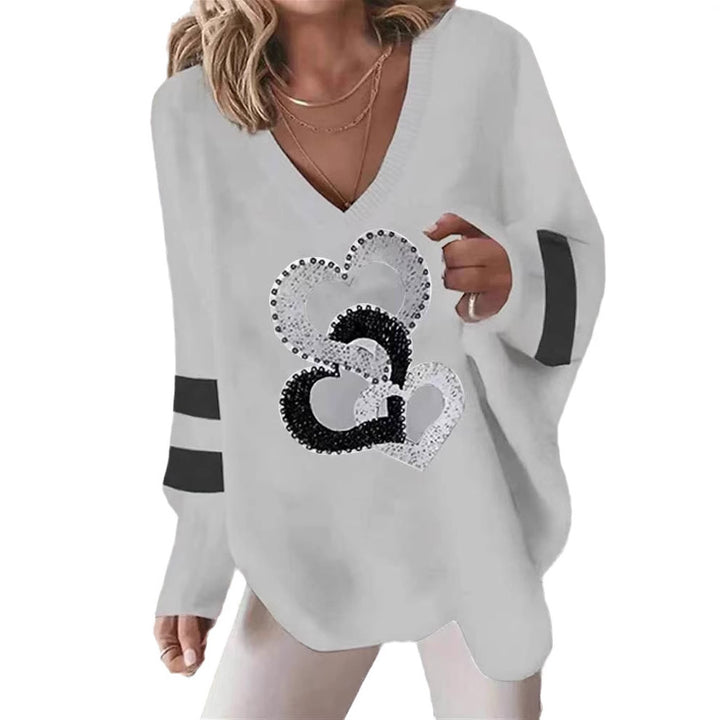 Hoodie pour femmes avec motif cœur et élégantes rayures contrastées Chic & Stil