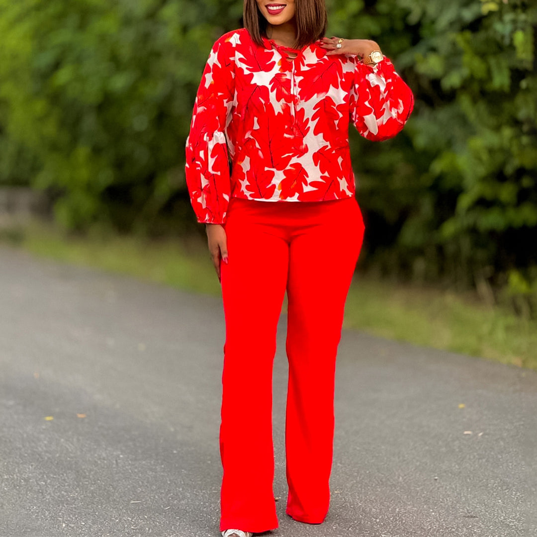 Women Elegant set consisting of a casual blouse with voluminous sleeves and classic pants Lune London