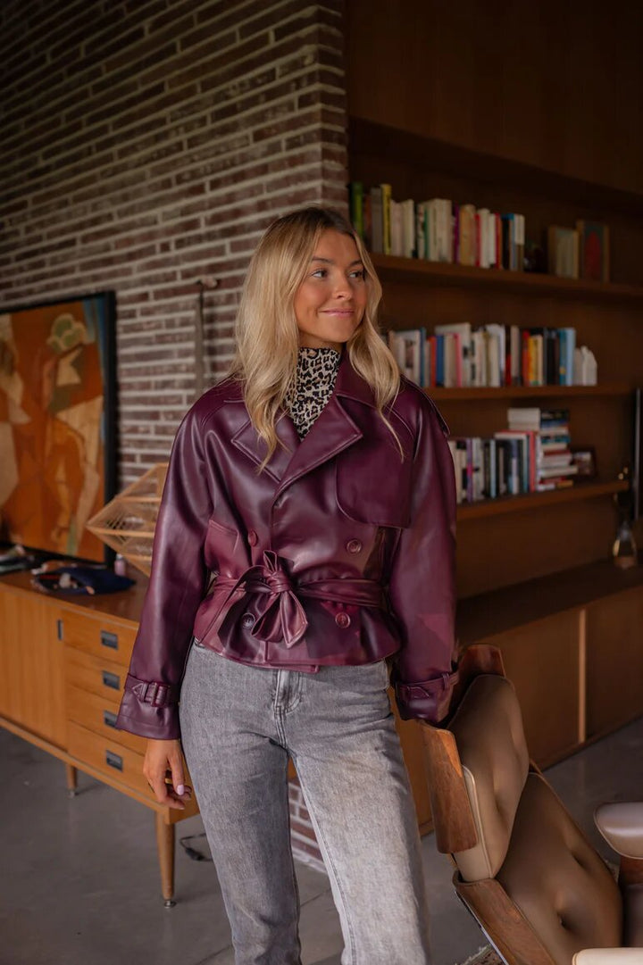 Short faux leather jacket for women with structured design and belted waist Lune London