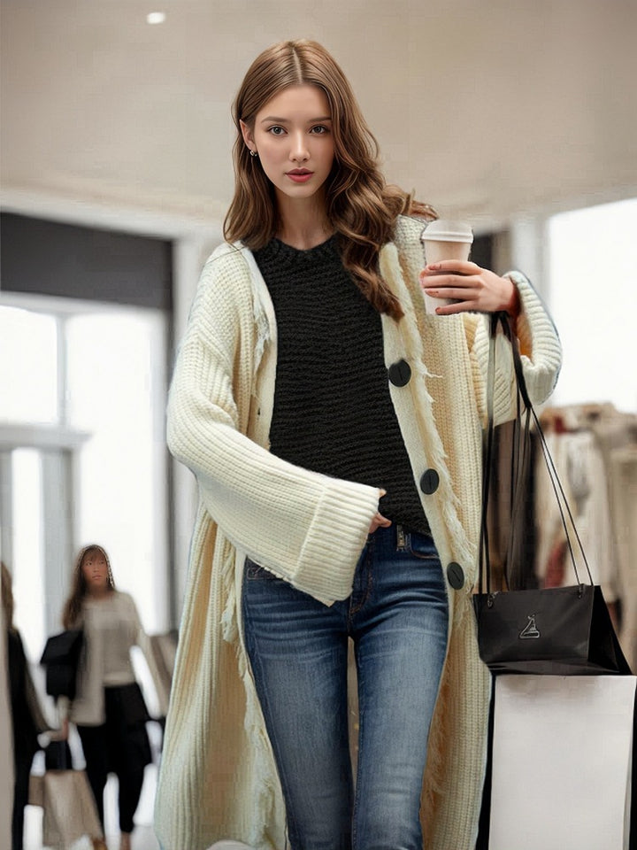 Chunky knit coat for women with fringes and elegant button closure Lune London