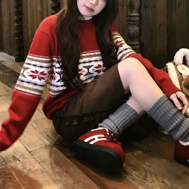 Sweater en tricot confortable pour femmes avec un mélange de motifs festifs Chic & Stil