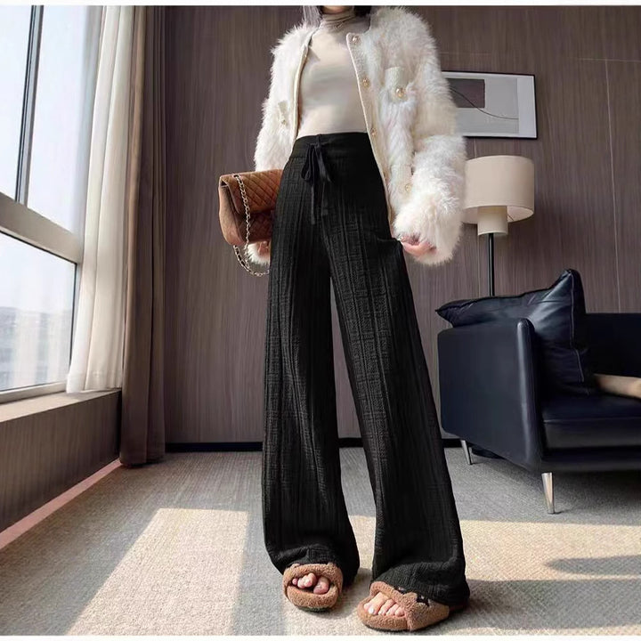 Pantalons d'été amples pour femmes avec taille élastique et motif rayé ferme Chic & Stil