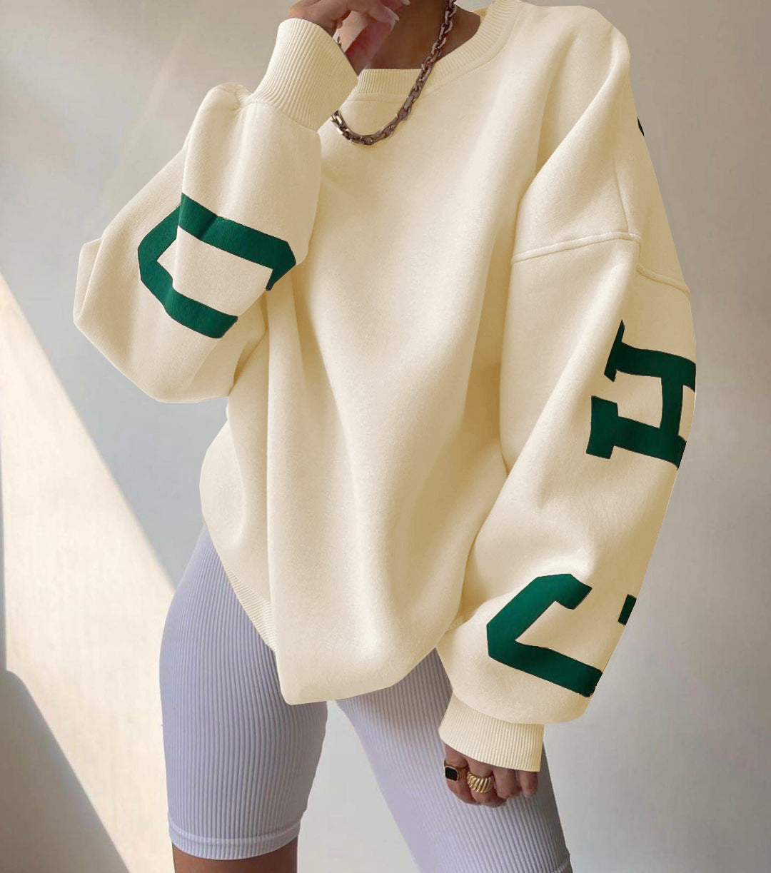 Ladies Oversized Sweatshirt with Chic Logo and Striking Style
