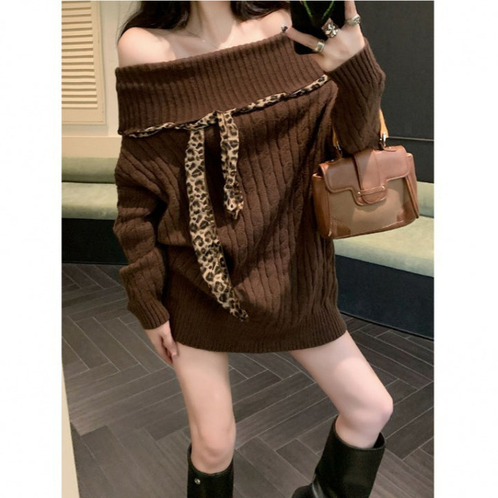 Chunky knit sweater for women with off-the-shoulder design and playful bow accent Lune London