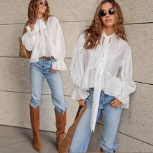 Fluid blouse for women with ruffles and a bow detail Chic und Stil