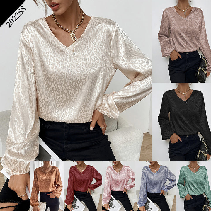 Blouse élégante pour femmes avec col en V et manches volumineuses Chic & Stil