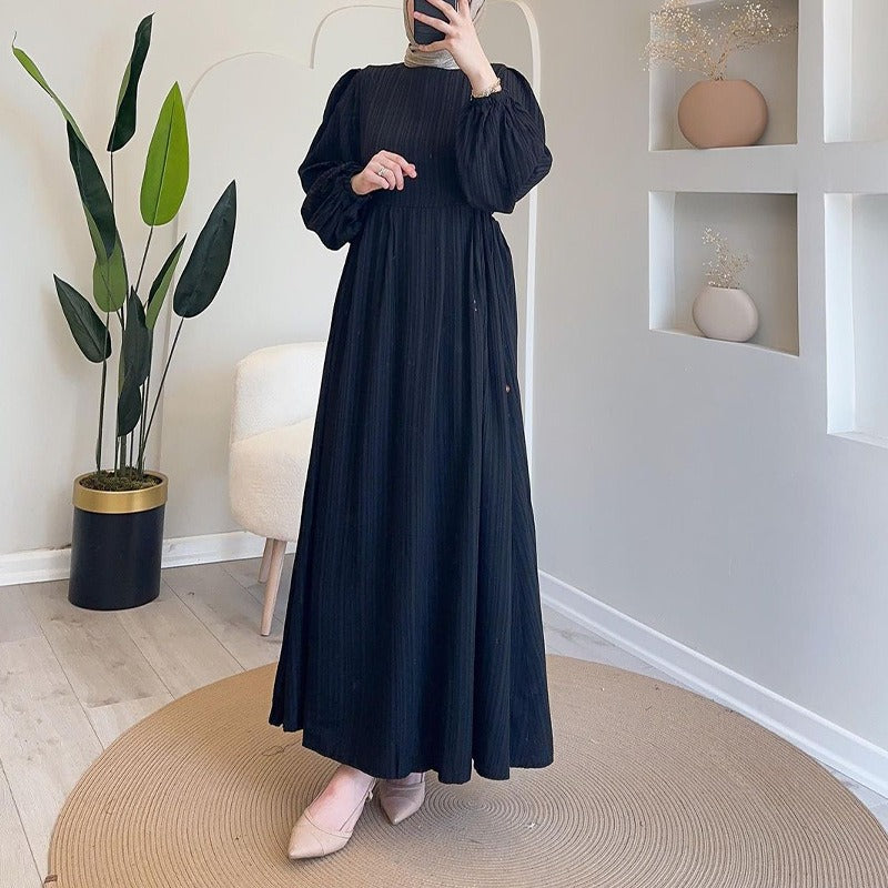Maxi dress for women with an elegant pleated design and long puff sleeves Lune London