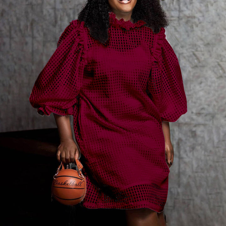 Transparent dress for women with voluminous puff sleeves and a chic check pattern.