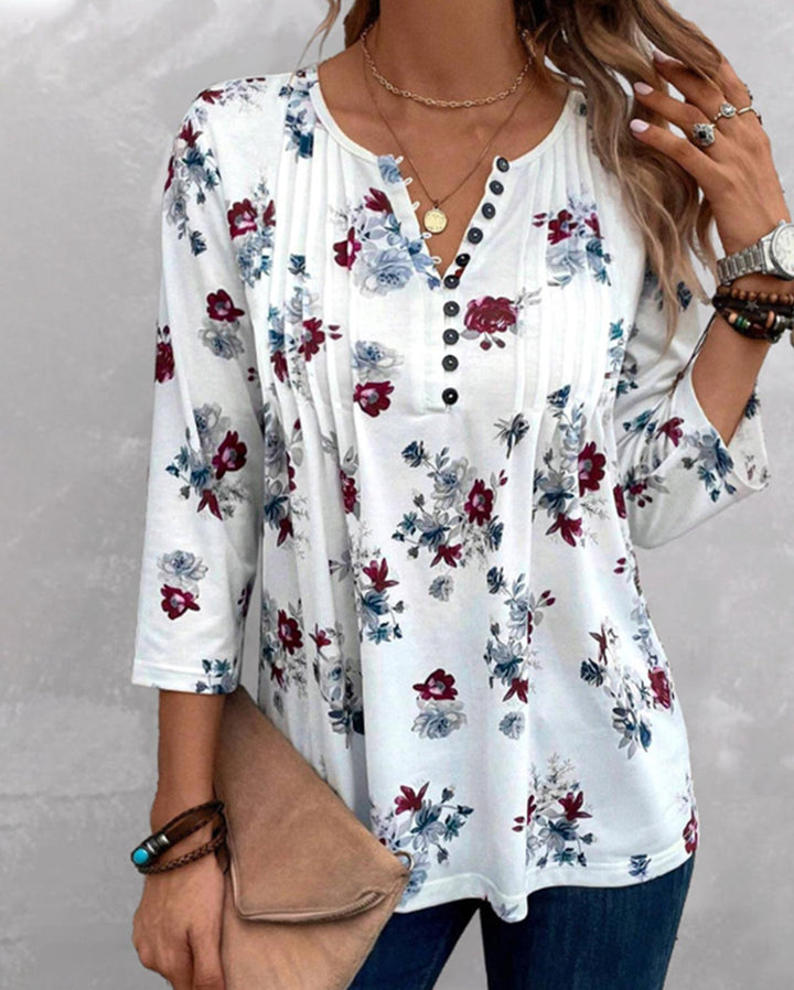 Blouse pour femmes avec imprimé floral et détails de boutons Chic & Stil
