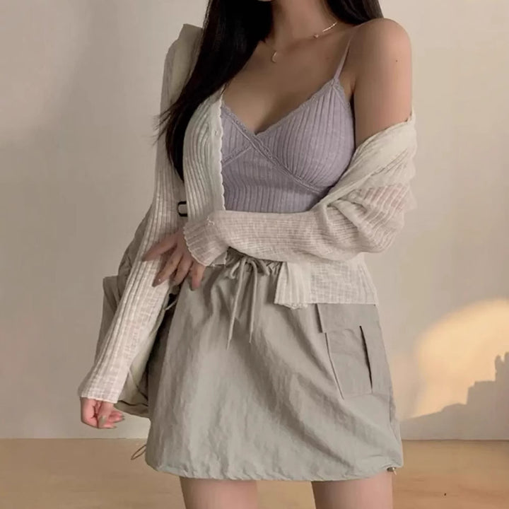Femmes cardigan ludique avec des détails décoratifs et un matériau léger Lune London