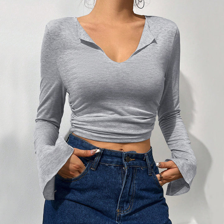 Short women's shirt with trendy bell sleeves and an elegant V neck Chic & Stil