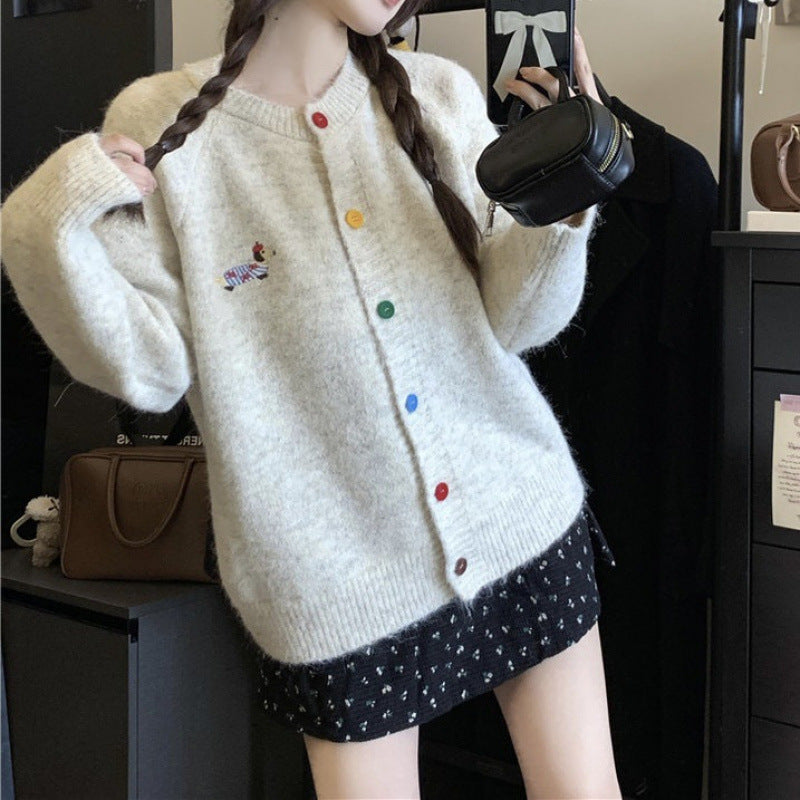 Knitted jacket for women with colored buttons and an embroidered pattern Lune London
