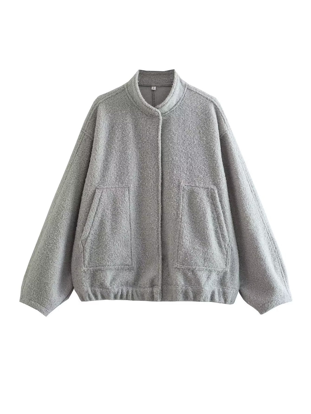 Oversized knit jacket for women in soft teddy fabric with a high collar and side pockets Lune London