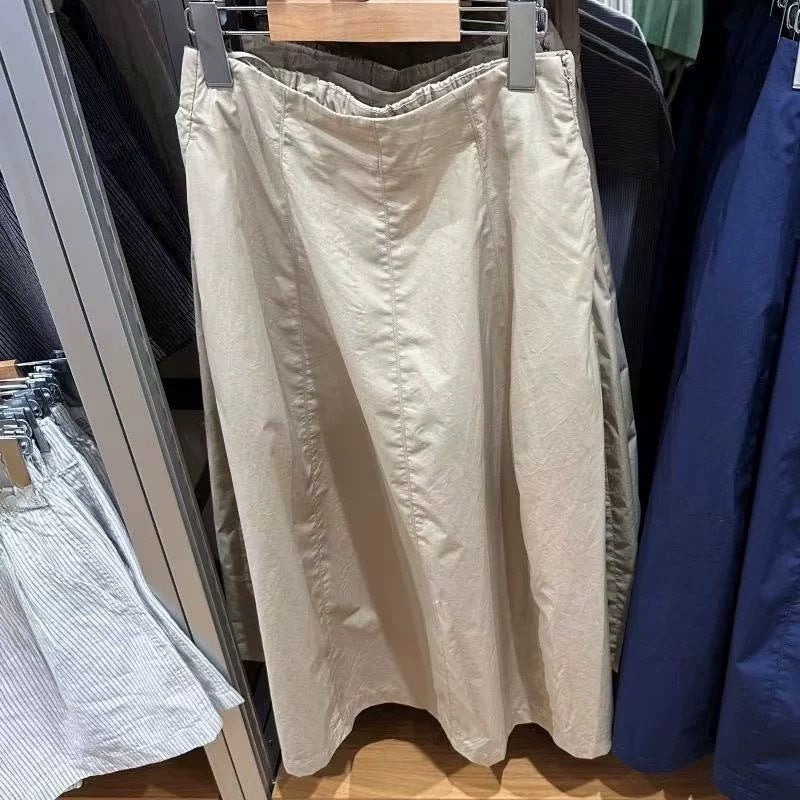 Jupe midi femme avec taille élastique et poches latérales Chic & Stil
