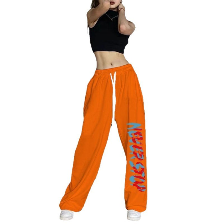Women’s leisure pants with elastic waistband and creative print Chic & Stil