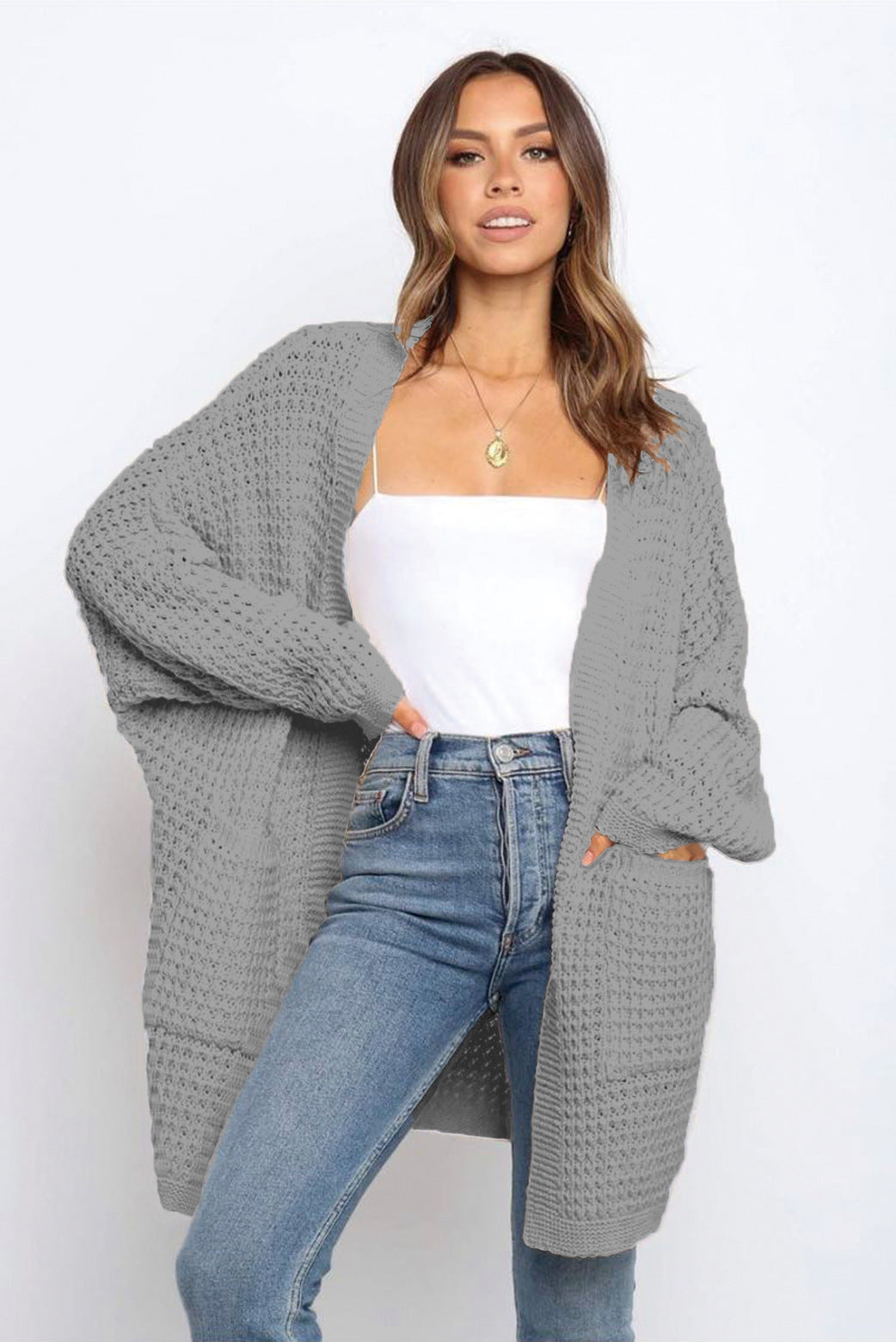 Cardigan en tricot épais pour femmes avec poches pratiques et coupe ample Chic & Stil