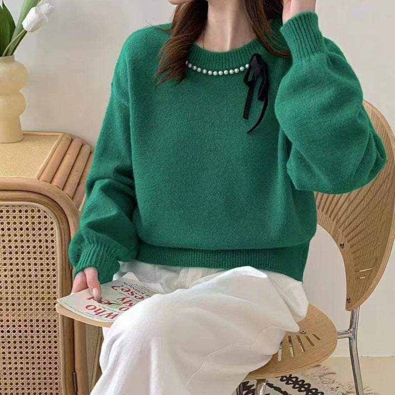 Ladies' fashion sweater with decorative band and pearl details Lune London