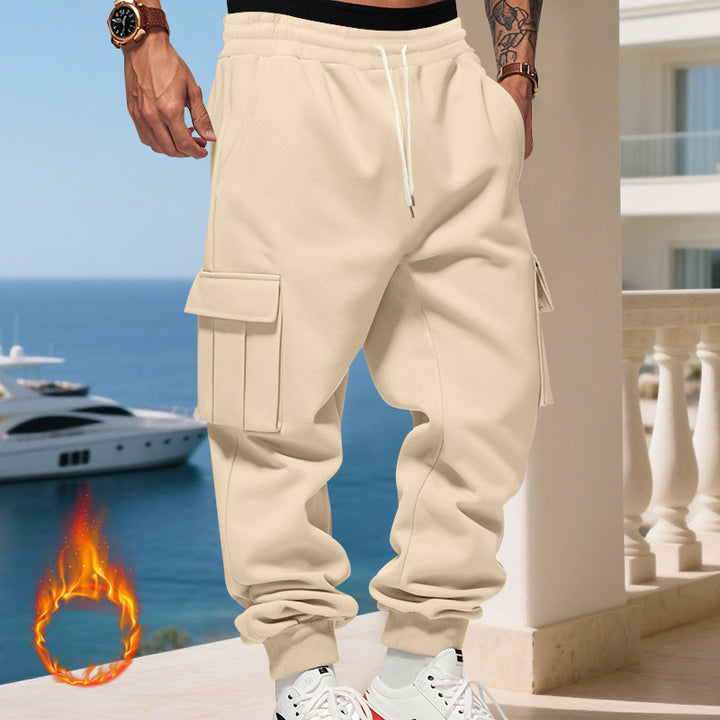 Men's cargo joggers with side pockets and elastic waistband. Chic and style.