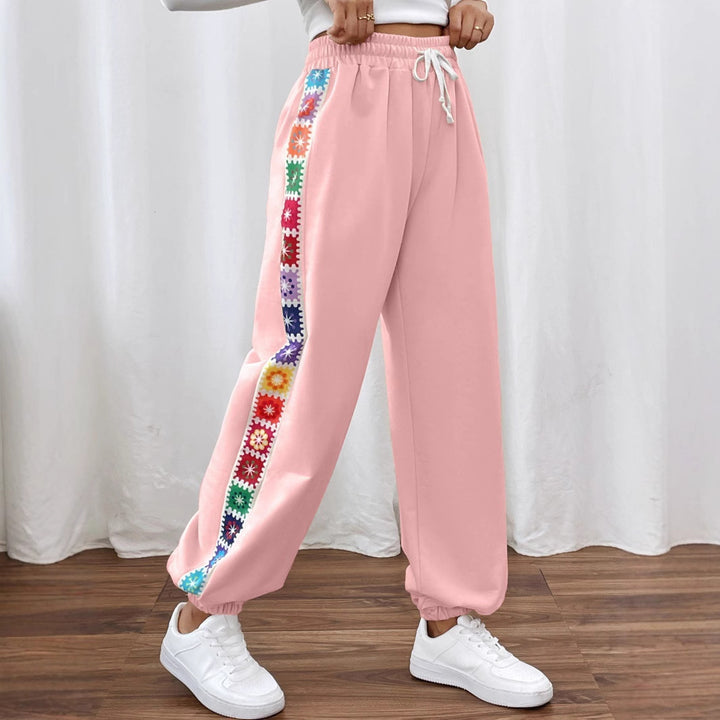 Leisure pants for women with a colorful floral pattern and an elastic waistband Lune London