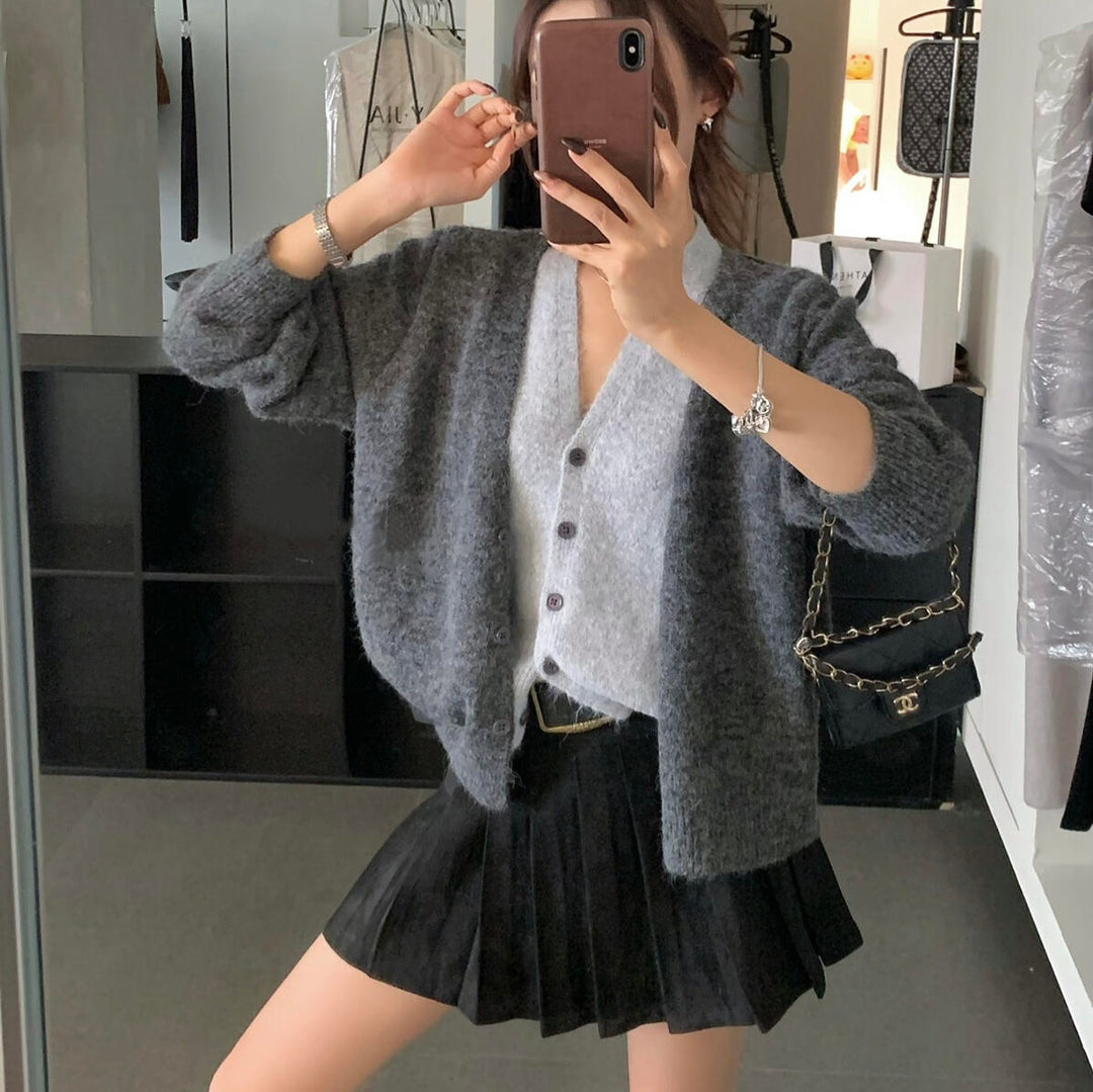Cardigan cosy pour femmes avec un décolleté en V ludique et un matériau doux Chic & Stil
