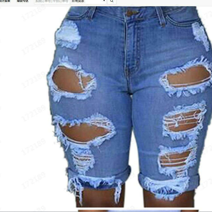 Women's destroyed denim trousers with a casual cut and trendy tear details Lune London