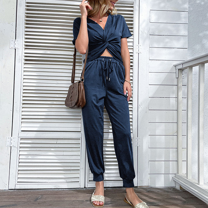Stylish cut-out jumpsuit for women with adjustable waist and short sleeves Lune London