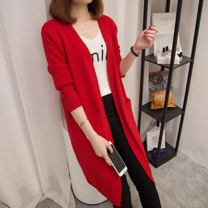 Ladies Long knitted cardigan with open front parts and deep pockets Lune London