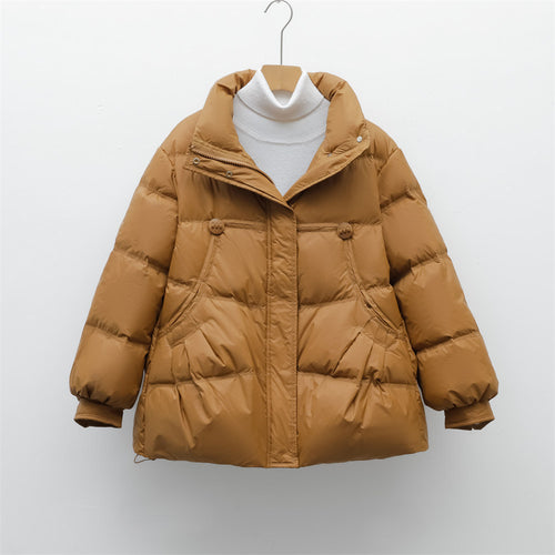 Bulky winter jacket for women with practical pockets and high collar Lune London