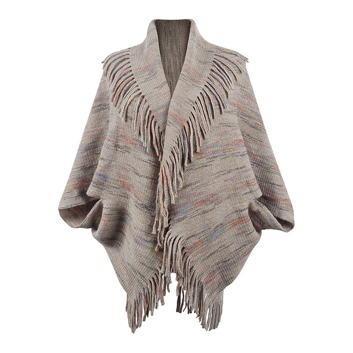 Ladies knitted poncho with luxurious fringes and a modern design Lune London