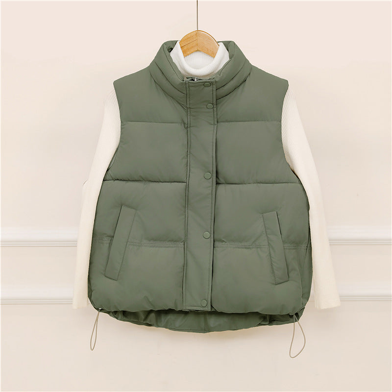 Sporty quilted vest for women with high collar and practical pockets Lune London